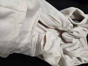 My travel hoodie with sleeping visor and more than 5 pockets! Beige in color